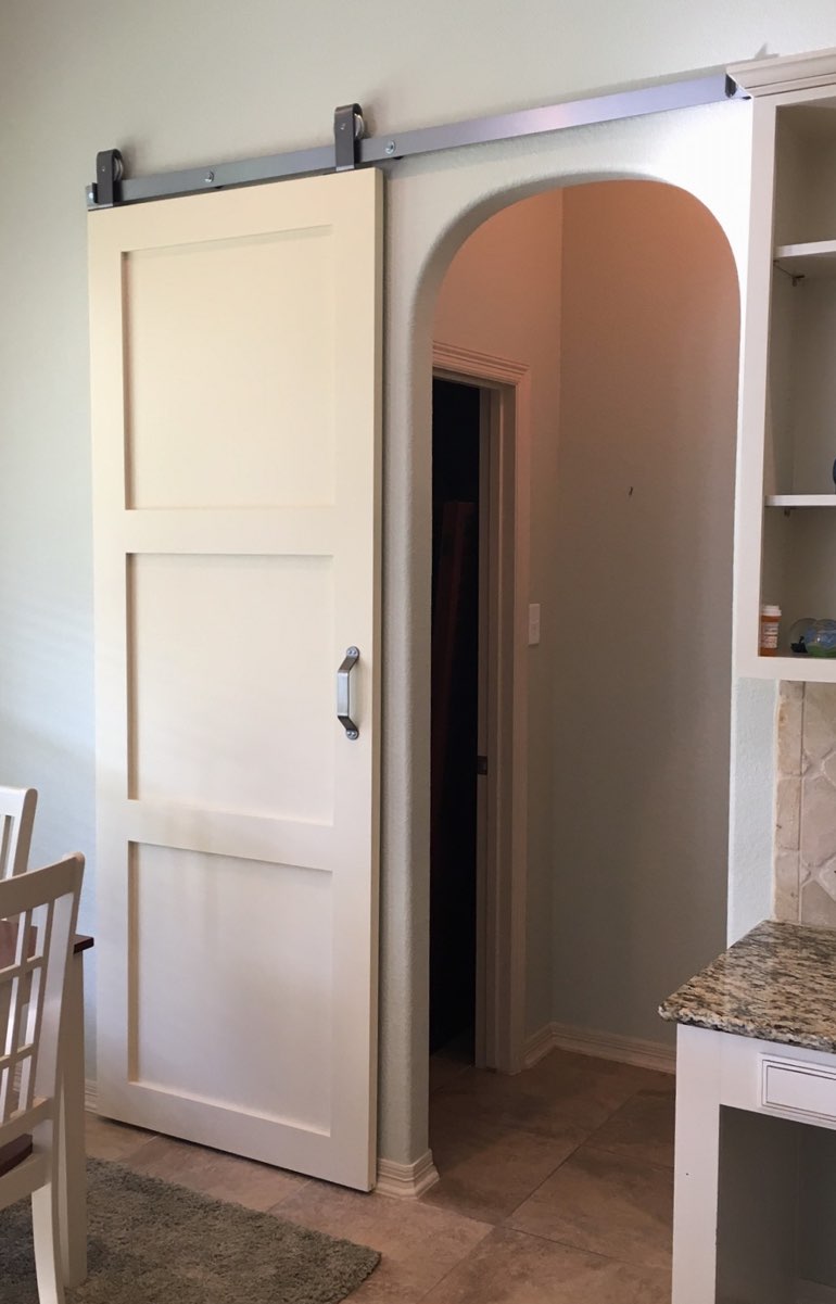 Contemporary style barn door in Hartford kitchen.